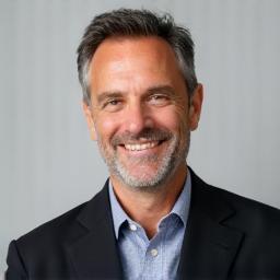 Professional headshot of team member.
