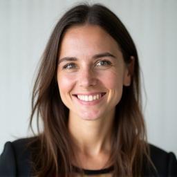 Professional headshot of team member.